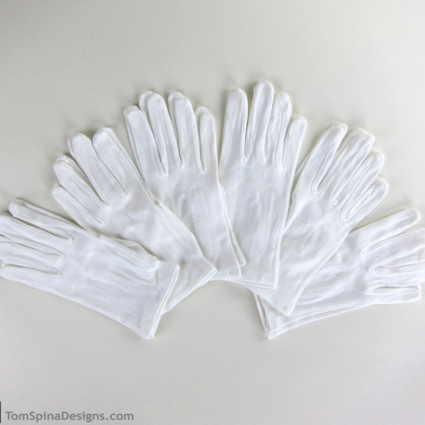 archival museum style white cotton gloves
