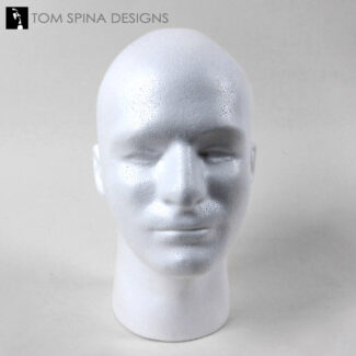 white styrofoam male lifesized mannequin head in styrofoam