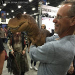 dinosaur puppet at trade show