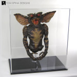 custom acrylic display cases or Chris Walas green gremlin puppet
