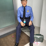 wax museum style figures of security guard