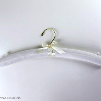 padded muslin hanger small in child size for costume and dress storage