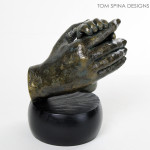 resin hand statue mother and child
