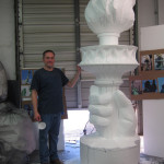 styrofoam artist carving statue of liberty torch