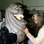 sculptor of lifesized slimer movie prop statue