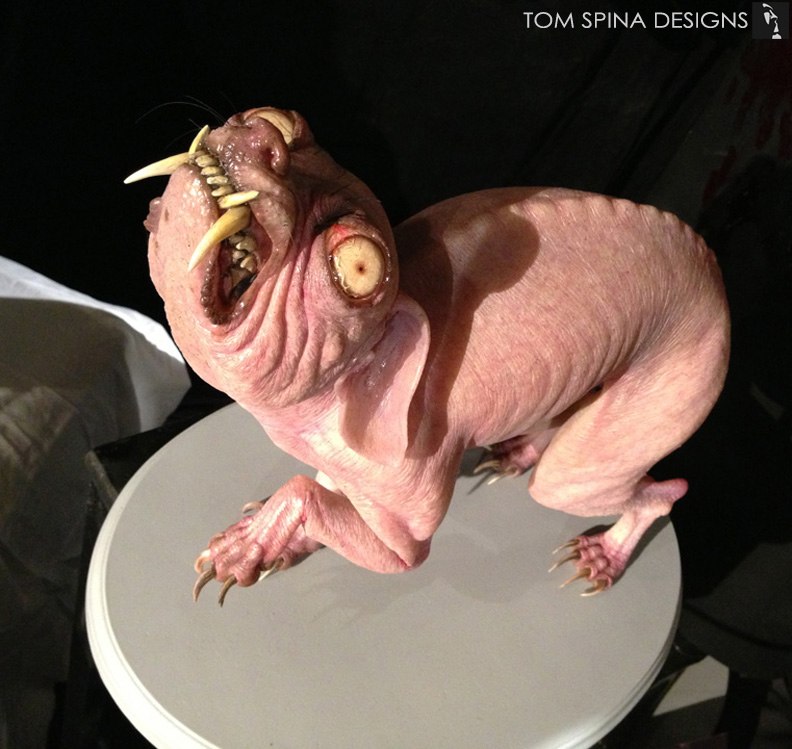creepy naked mole rat sculpture