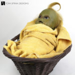 custom display and restoration of baby grinch puppet movie prop