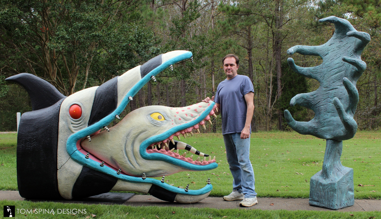 custom large foam props of a Beetlejuice Sandworm and claw sculpture