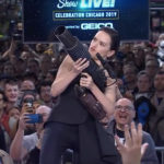 Rey actress, Daisy Ridley with custom t-shirt gun