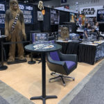 life-sized chewbacca statue and emperor throne desk chair