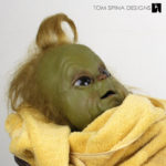 custom display and restoration of baby grinch puppet movie prop