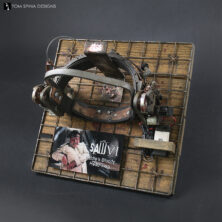 Display for Saw VI prop head trap display from the movie